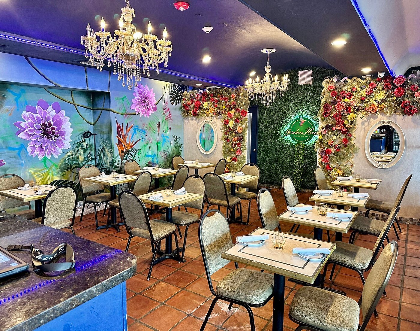 Interior dining area of the restaurant with decorated tables and warm lighting